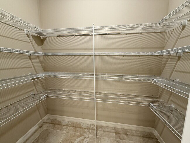 Building Photo - Spacious 4-Bedroom Retreat with additional office/den in the Heart of Trinity!