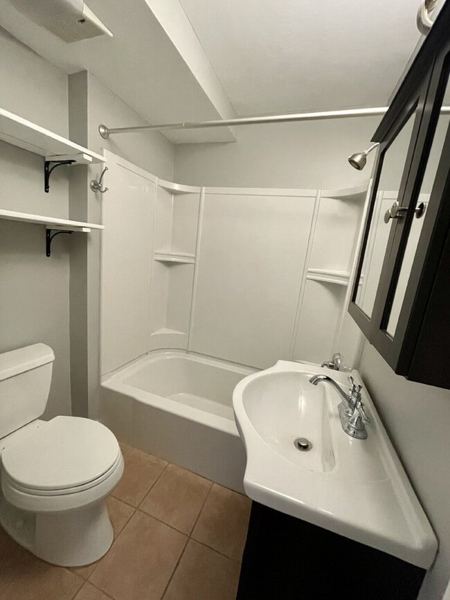 Building Photo - Seeking roommate for a newly updated lower-level unit with a porch and private yard, 1.5 miles fr...