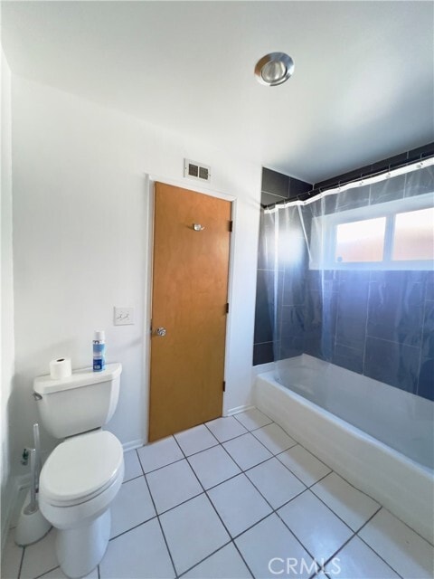 Building Photo - 1521 W Westmont Ave