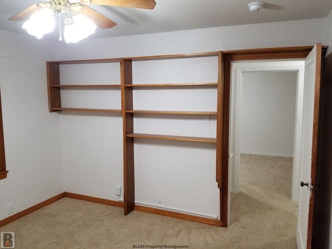 Building Photo - Massive Corner-Lot Home with Retro Charm & Shady Backyard!