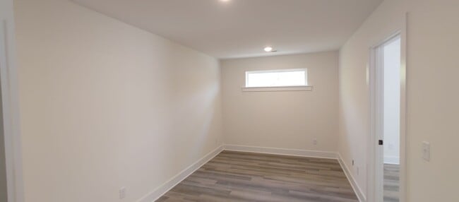 Building Photo - 5-bedroom home with 3 car garage and fully...