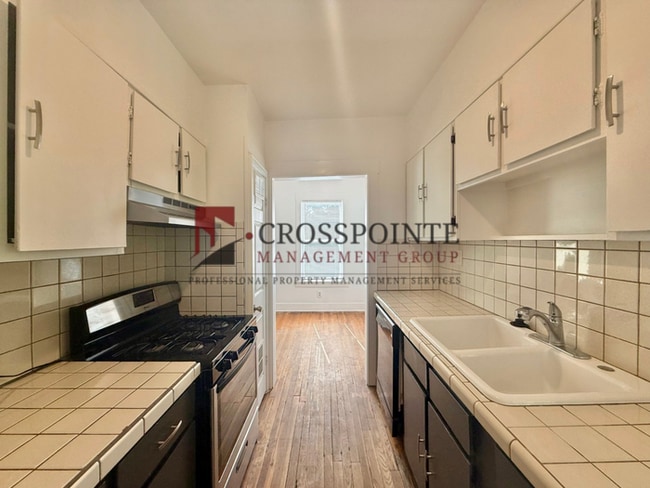Building Photo - Tour Today! 2 Bedroom 1 Bathroom Upstairs Unit!