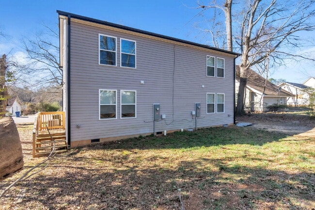 Building Photo - Elegant 3 Bedroom, 2.5 Bathroom Duplex with 1-Car Garage in Woodruff $1750/mo rent