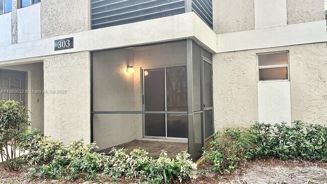 Building Photo - 303 Gardens Dr