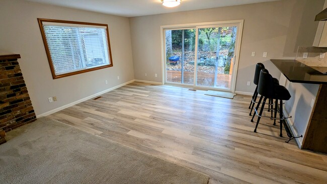 Dining room with door to the deck - 3140 SW Chintimini Ave