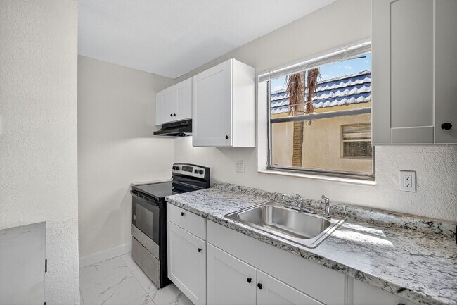 Building Photo - Bright & Modern 1-Bedroom Apartment in Pri...