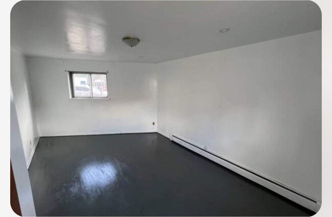 Building Photo - 23-30-30 42nd St