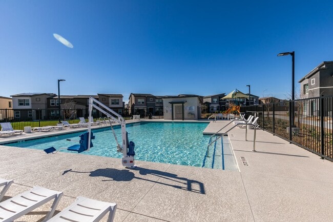 Building Photo - Gorgeous Townhome with upgrades in gated community* 3 large bedrooms, 2 car garage*Community pool...