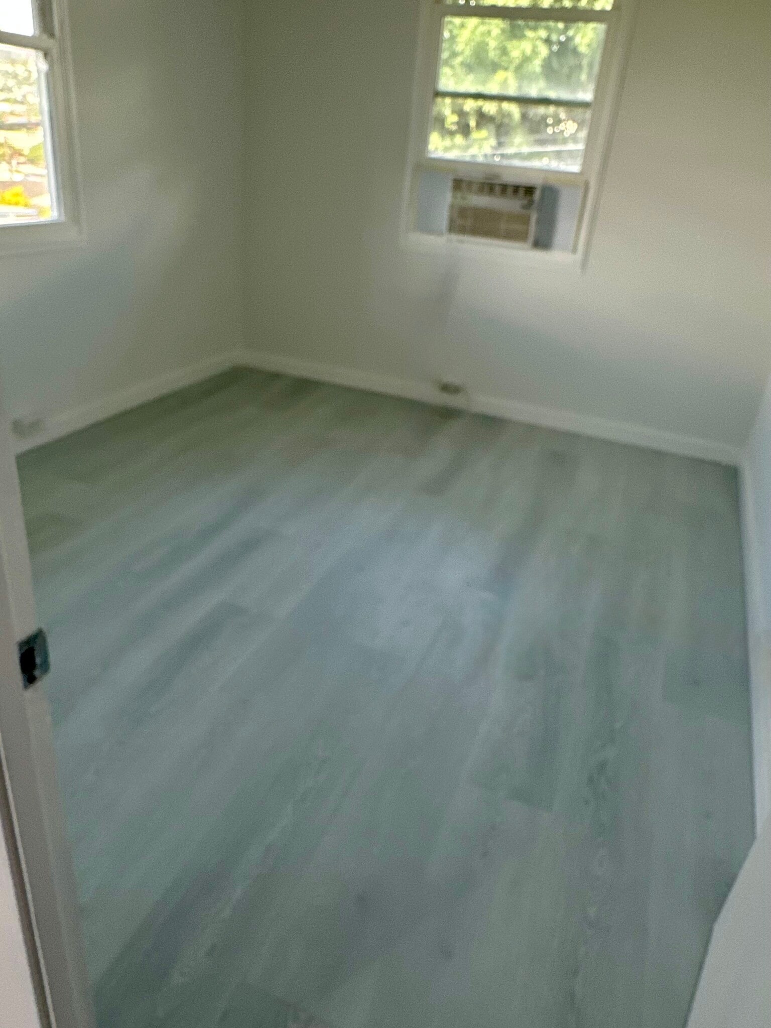 New 8mm luxury vinyl plank (LVP) flooring installed. - 1769 Puowaina Dr