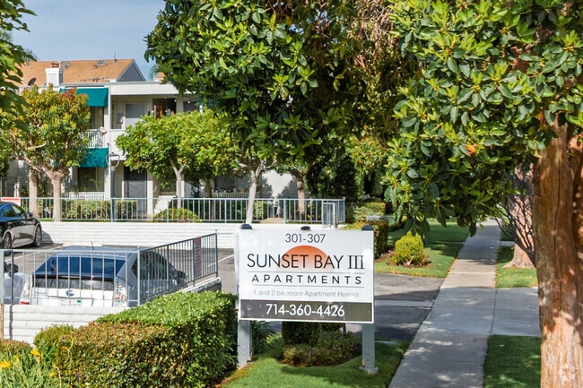 Building Photo - Sunset Bay III Apartment Community