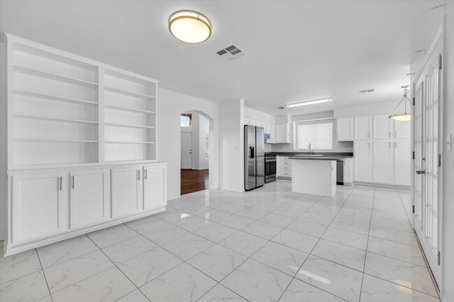 Building Photo - SE!!  Windmill and 215!! Newly remodeled!! All Tile Floors down stairs!! Low Maintenance Desert L...