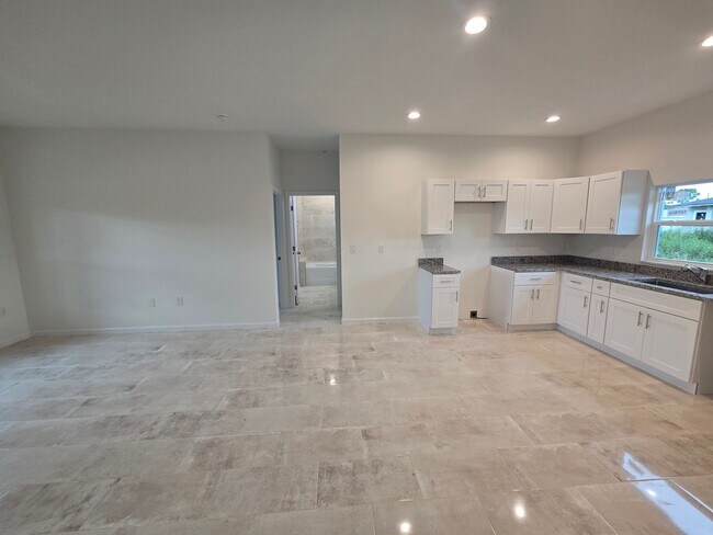 Building Photo - BRAND NEW 3/2/1 -SW LEHIGH ACRES FL