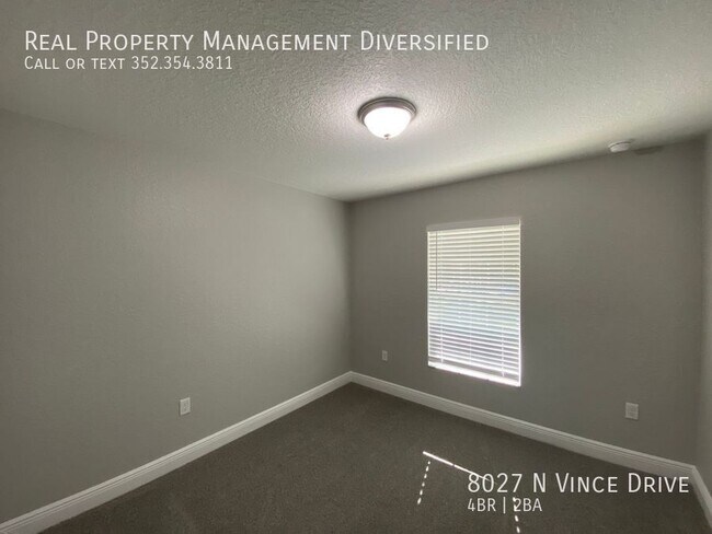 Building Photo - 8027 N Vince Dr