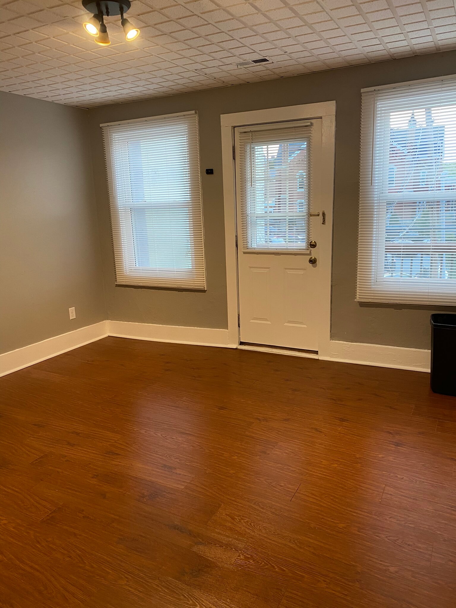 Living room and access to deck - 919 Massachusetts St