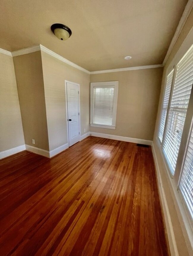 Building Photo - Introducing WesleyHeights401, a charming 3...
