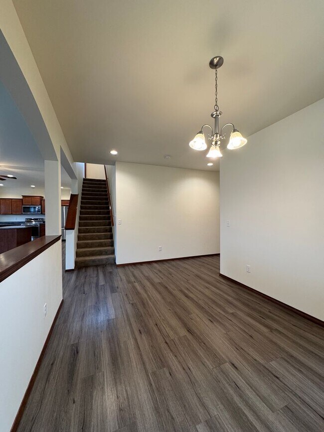 Building Photo - Spacious 5-Bedroom Home with Fenced Yard & Oversized Garage