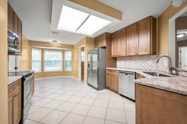 Building Photo - Beautiful 4BR Home with Fireplace, Screene...