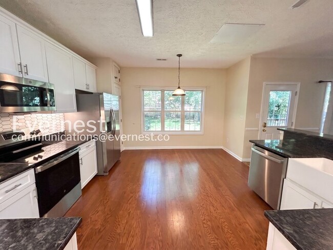 Building Photo - 4 Bed - 2.5 Bath Spacious Home with Modern Amenities and Community Perks / Available Now!