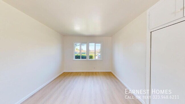 Building Photo - 9802 E Camino Real Ave