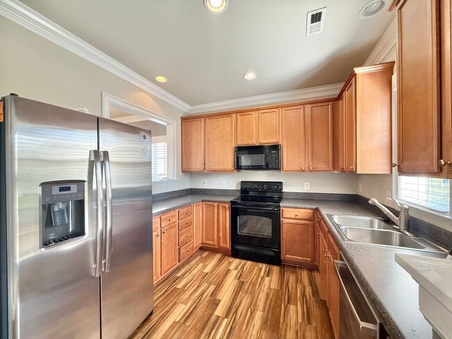Building Photo - **OFFERING REFUNDABLE APPLICATION FEES & $150 MOVE IN PROMOTION** Modern 2BD, 2.5BA Raleigh Home ...