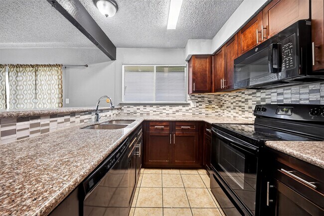 Building Photo - 13610 Sunswept Way