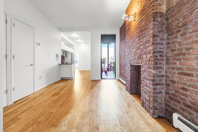 Building Photo - Welcoming  1-Bedroom with Home Office and Private Terrace.