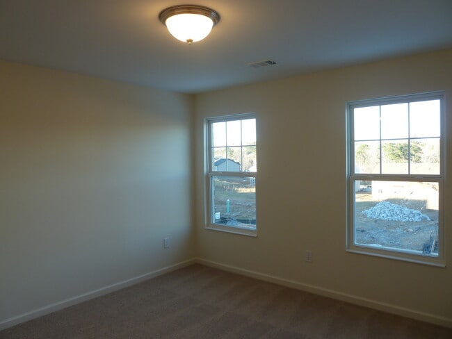 Building Photo - Beautiful Brick Home in Primrose Creek – B...