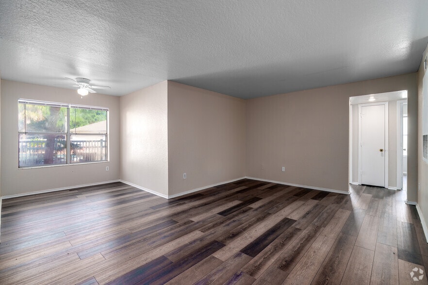 4BR, 2BA - 1,296SF - Living Room - Tierra Vista RFK LLC