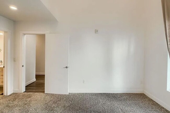 Building Photo - Modern LoHi Living with Rooftop Deck & City Views!!