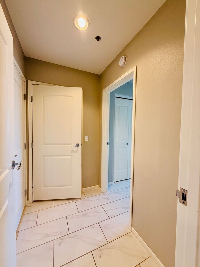 Building Photo - Modern High-Rise Condo with Stunning City and Mountain Views-Near LV Strip, Allegiant Stadium, To...