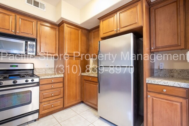 Building Photo - Elegant Westside Condo with Modern Upgrades and Private Patios