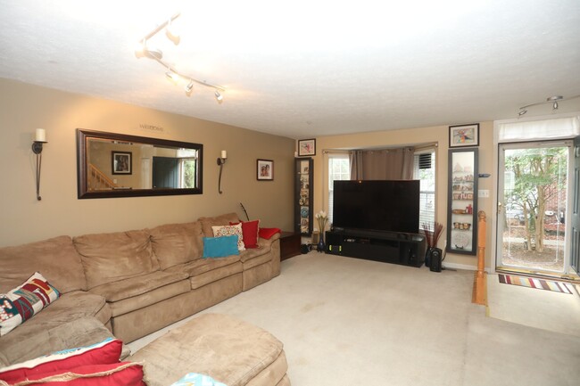 Building Photo - Available -Spacious 2 Car Garaged Townhome...