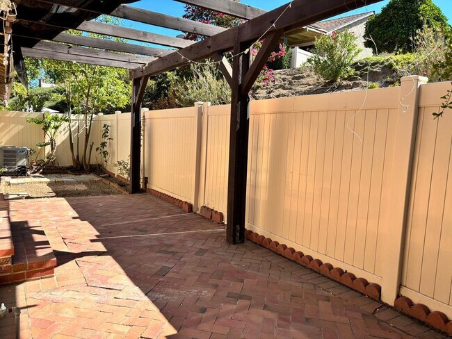 Building Photo - Available Now is a Condo style Townhouse i...