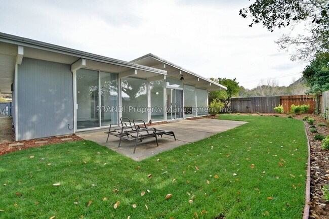Building Photo - "Charming 4-Bedroom Oasis in San Rafael – ...