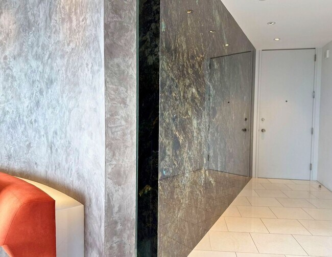 Building Photo - Designer Luxury. Iconic Views. Extraordinary Living.