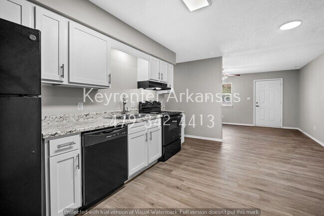 Building Photo - Cozy 2 Bedroom Duplex with Fireplace & Spacious Backyard!