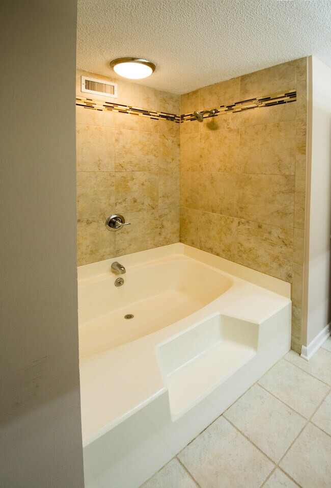 Garden Tub with tile surround - 115 Beechnut St
