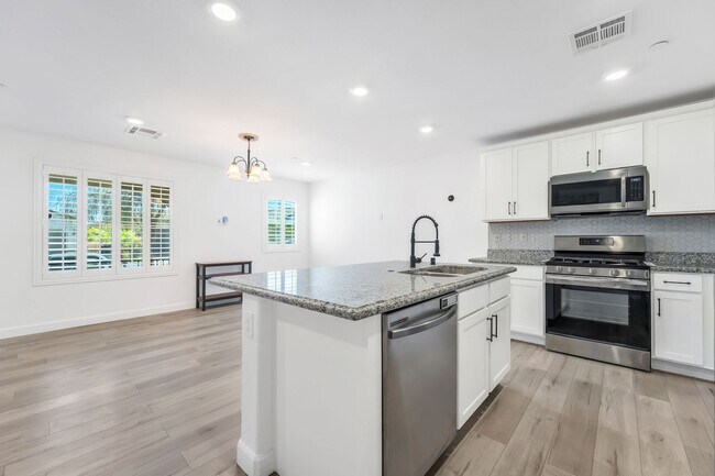 Building Photo - Modern Cadence Living with Designer Upgrades & Resort-Style Amenities!