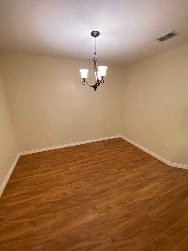 Building Photo - One-Story End Unit Oasis Backing to Preserve - No Carpet + Plantation Amenities!!