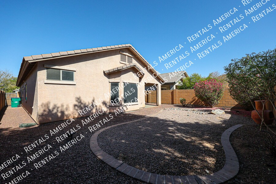 Building Photo - 12823 W Modesto Dr