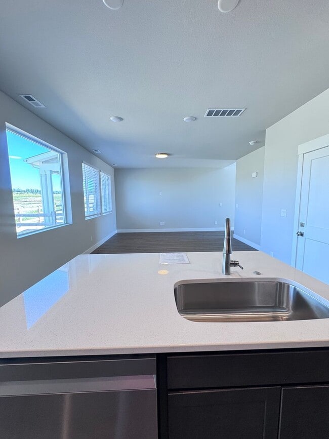 Building Photo - Sage Meadows II Townhomes — Lakeside Living Meets Modern Comfort!