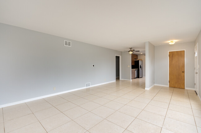 Living Room is large enough to fit a dining area - 211 Farview Drive