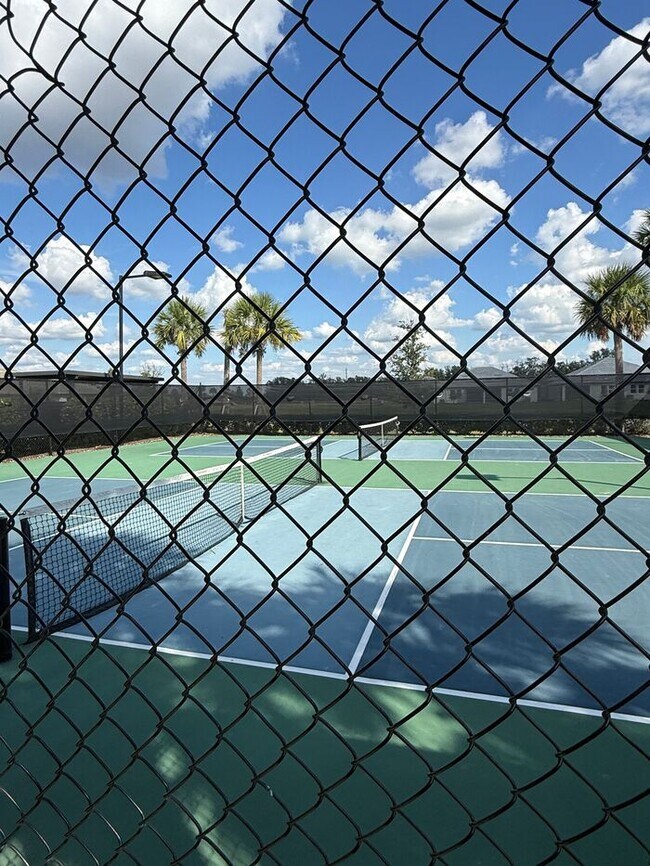 Building Photo - 2BR 2BA Home w/ Quartz Island Kitchen + Pond View Lanai + 2-Car Garage in Lakewood Ranch