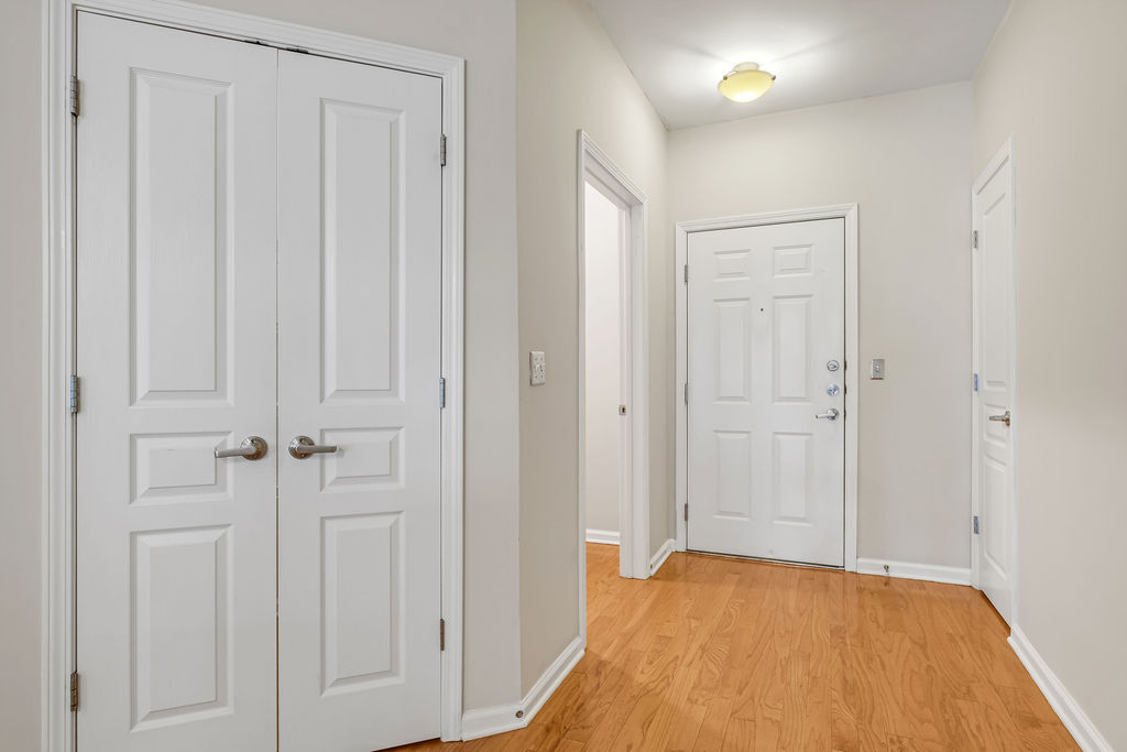 Looking at the entrance. Laundry room and doors to Large Walk in Pantry - 1803 Broadway