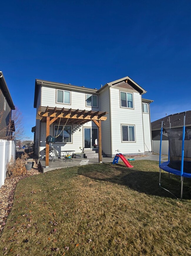 Building Photo - Spacious 4BR with Modern Upgrades and Comp...