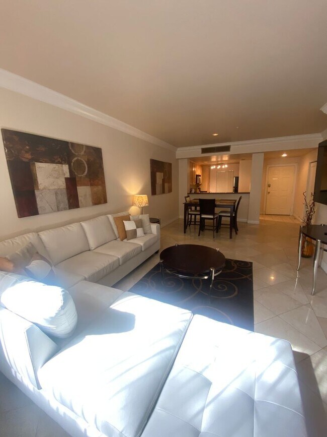 Building Photo - Long or short term available!  Live in lux...