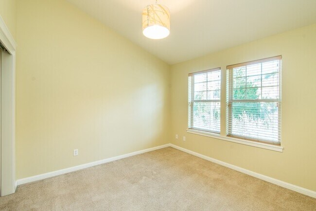 Building Photo - Spring Into Your New Home - Premium Corner Townhome Now Available!