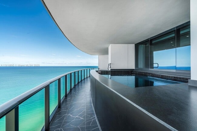 Building Photo - 18555 Collins Ave