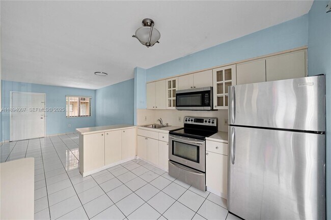 Building Photo - 5490 W 21st Ct