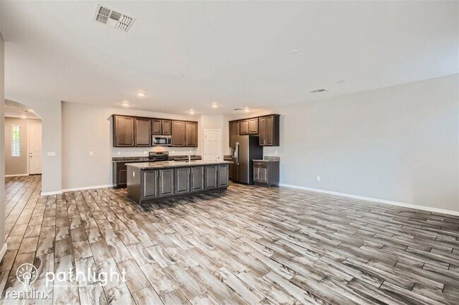 Building Photo - 4 br, 2.5 bath House - 12042 W Fillmore St...